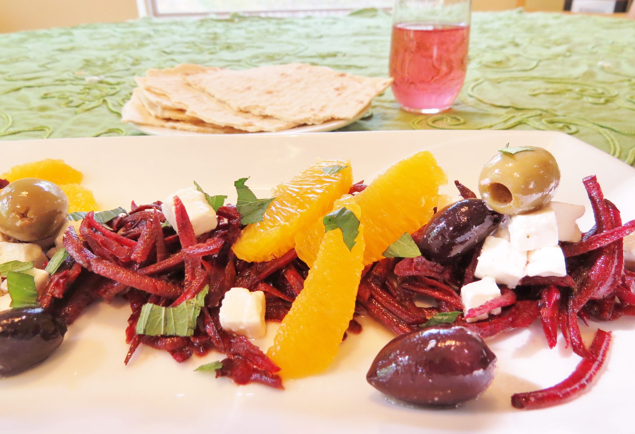 marinated beet salad with juicy fresh orange segments, cured olives and salty, crumbly feta cheese.